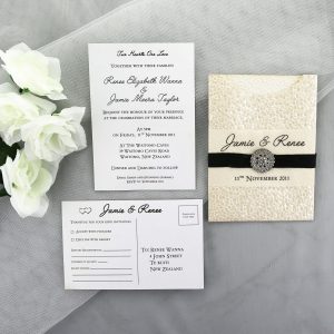 WEDINV02 White Pebbles C6 Pouch Invitation with Black Ribbon and Diamante with rsvp