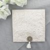 WEDINV30 floral embossed white wedding invitation with diamante and tassle