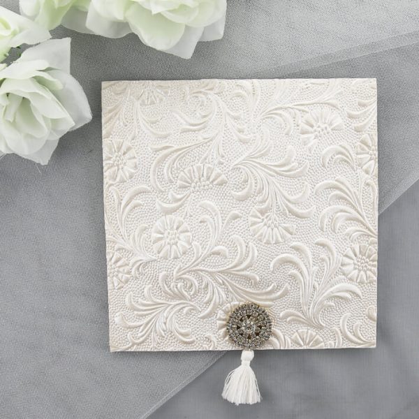 WEDINV30 floral embossed white wedding invitation with diamante and tassle