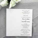 WEDINV31 inside of white Textured Invitation with Blue Satin Ribbon