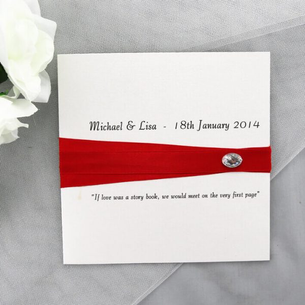 WEDINV39 Red ribbon and diamante white wedding invitation