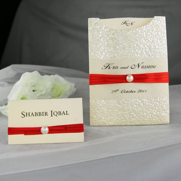 WEDINV55 Cream Pebble Pocket Invitation with Red Ribbon and Pearl with place card