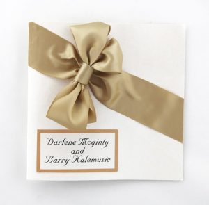 WEDINV102 brown satin diagonal bow and ribbon ivory wedding invitation