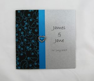 WEDINV119 Silver and blue wedding invitation with heart diamante