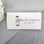 WEDINV128 Embossed Floral White and Purple Wedding Invitation with Ribbon and Diamante