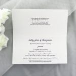 WEDINV128 inside of Embossed Floral White and Purple Wedding Invitation with Ribbon and Diamante