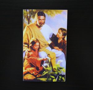 Front of childrens religious christian folded memorial card