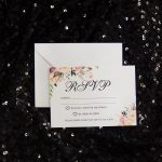 Floral rsvp with white envelope