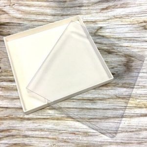 Ivory invitation box with clear lid off