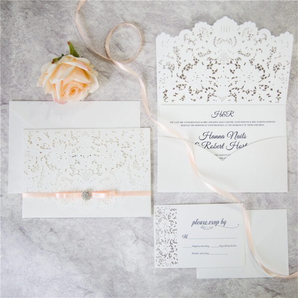 WEDINV142 White lasercut pocket wedding invitation set with apricot ribbon bow and diamante