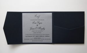 WEDINV161 inside of navy blue pocket fold wedding invitation with silver insert on left hand side and pocket on right hand side
