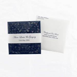 WEDINV146 front of navy blue lasercut invitation with envelope