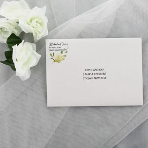 WEDINV162 white and peach flowers leafy wedding envelope