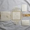 WEDINV187 inside of Ivory lasecut wedding invitation with gold ribbon
