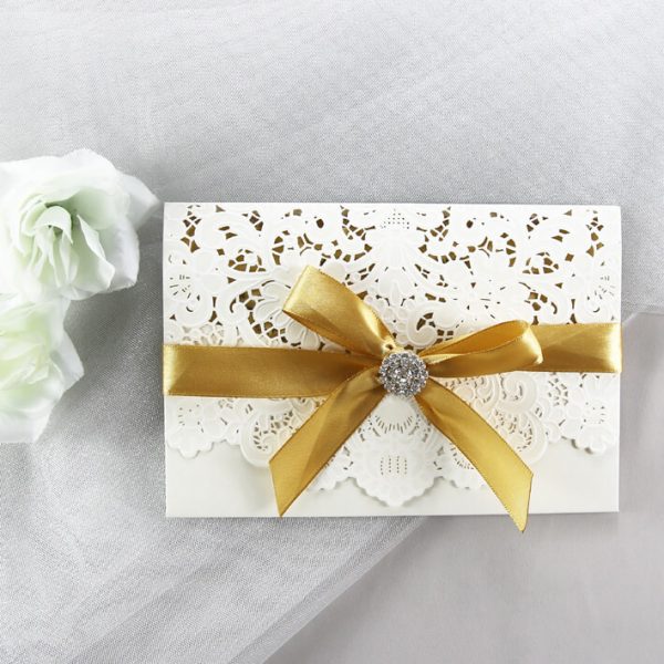 WEDINV201 Ivory pocketfold lasercut wedding invitation with gold ribbon and gold glitter