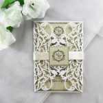 WEDINV202 White lasercut wedding invitation with gold glitter